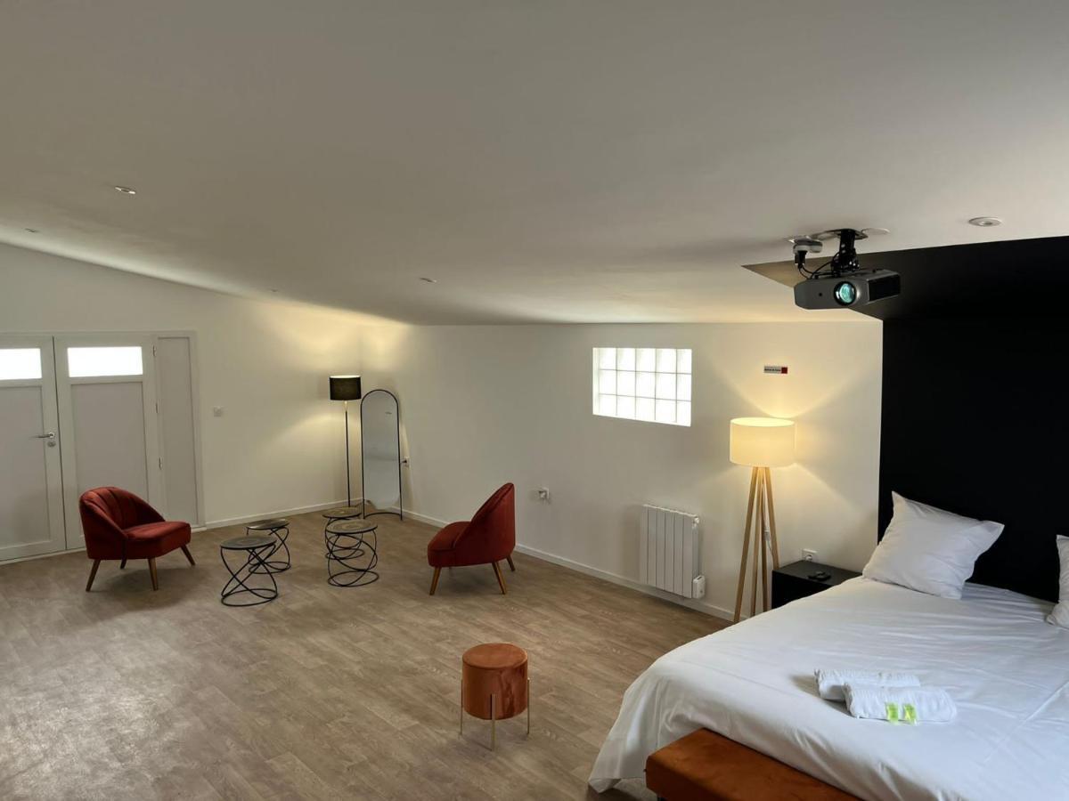 NG SuiteHome Queven Balnéo I Rétroprojecteur Extérieur photo